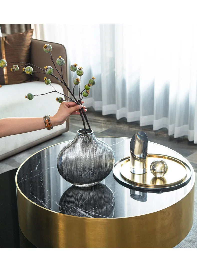 Silver brushed electroplated glass vase L size 25x13x25cm with striped finish on table