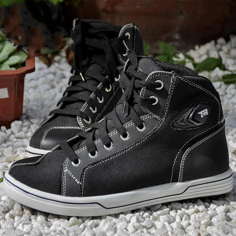 Black and grey men's casual motorcycle short boots with breathable panels and a non-slip sole.