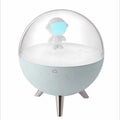 Modern USB LED night light with plastic shade in white and blue colour options on a desk.