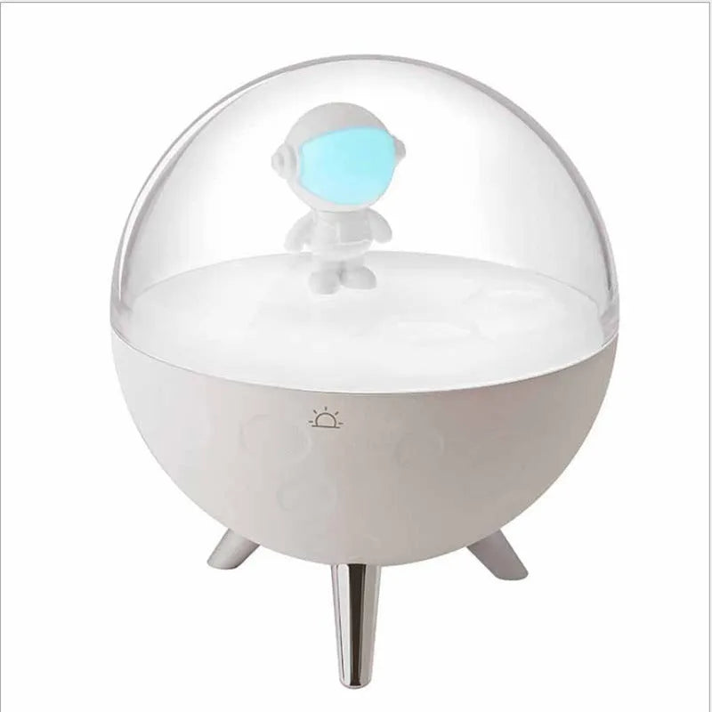 Modern USB LED night light with plastic shade in white and blue colour options on a desk.