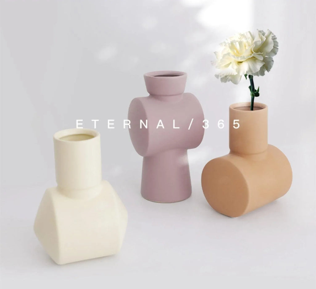 Nordic Morandi style ceramic vase with hammer texture in beige, brown, or purple.