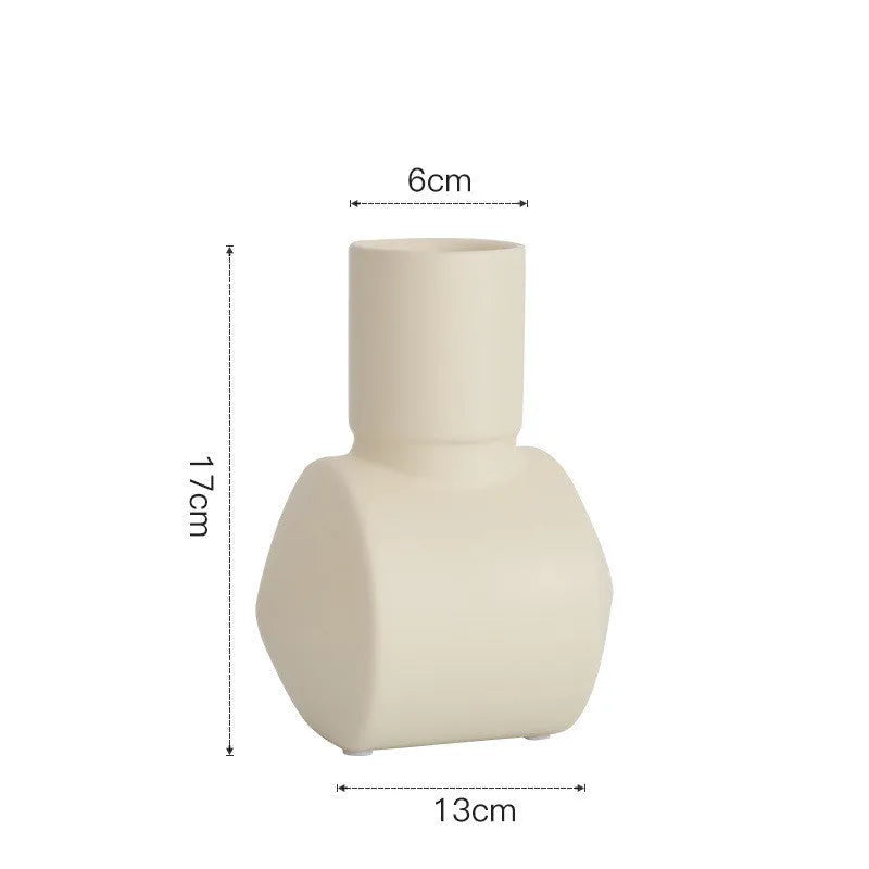 Nordic Morandi style ceramic vase with hammer texture in beige, brown, or purple.