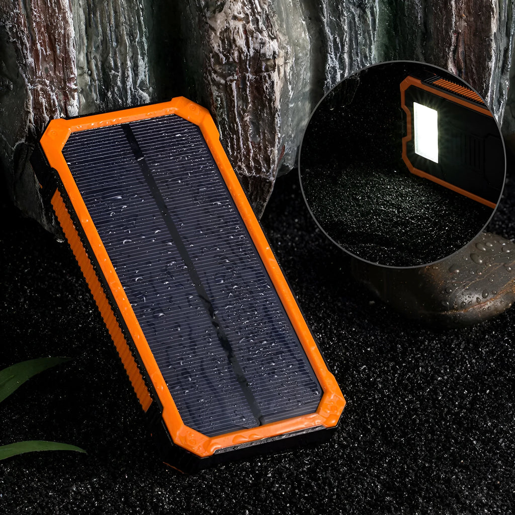 Orange three proofs solar power bank showing solar panel and USB ports