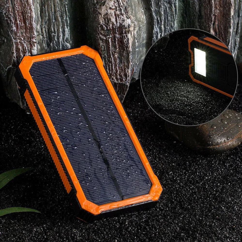 Orange three proofs solar power bank showing solar panel and USB ports