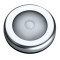 Silver wireless motion sensor night light with a square 80mm design on a table.