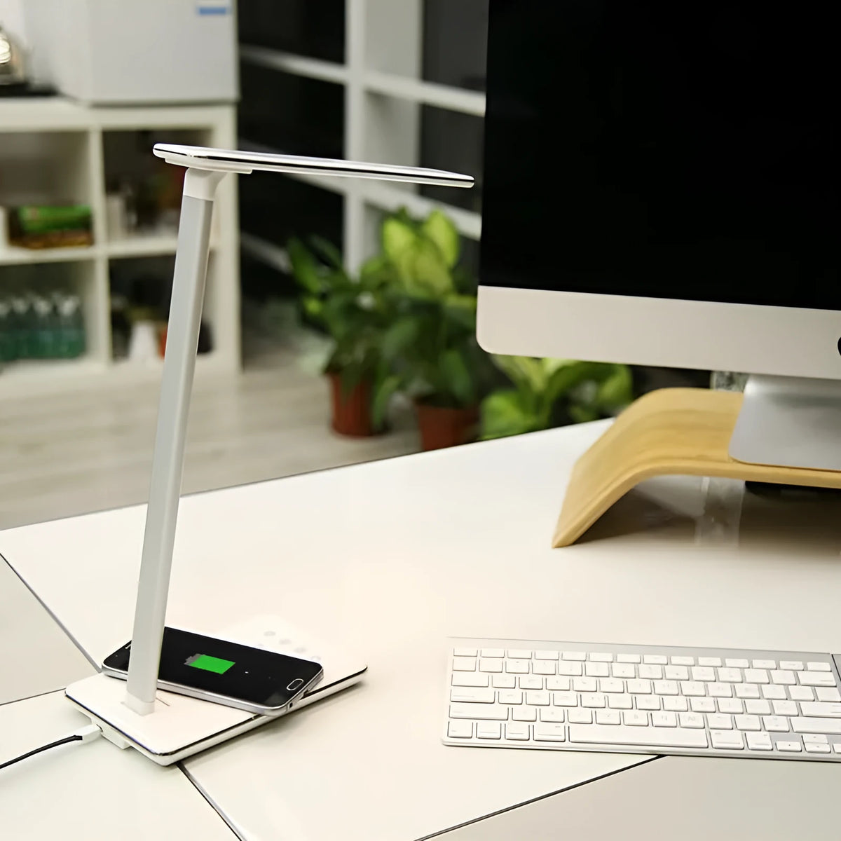 Black and white wireless charging desk lamp with touch controls and USB connection
