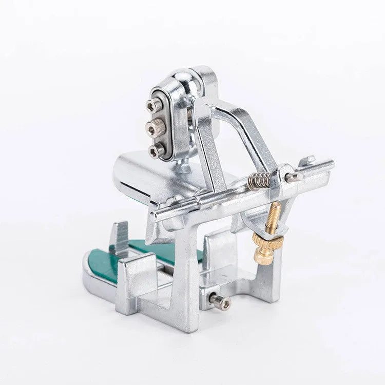 Korean dental articulator with adjustable upper and lower cast holders and two articulated joints.