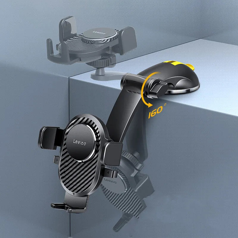 Folding suction cup mobile phone car holder in carbon fiber black on a car dashboard