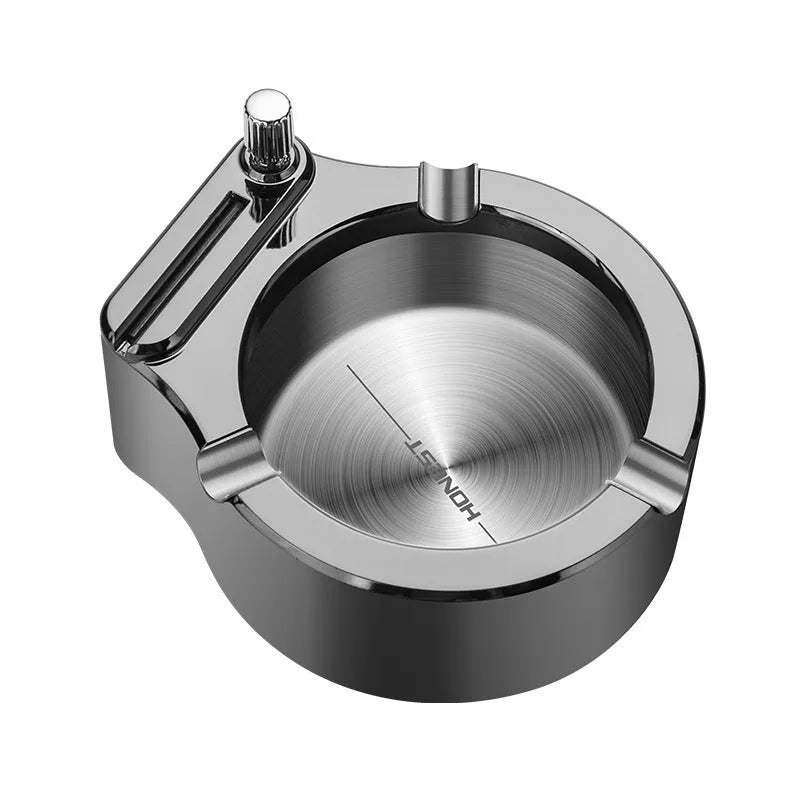 Large blue metal ashtray with a built-in permanent match lighter and three cigarette slots.