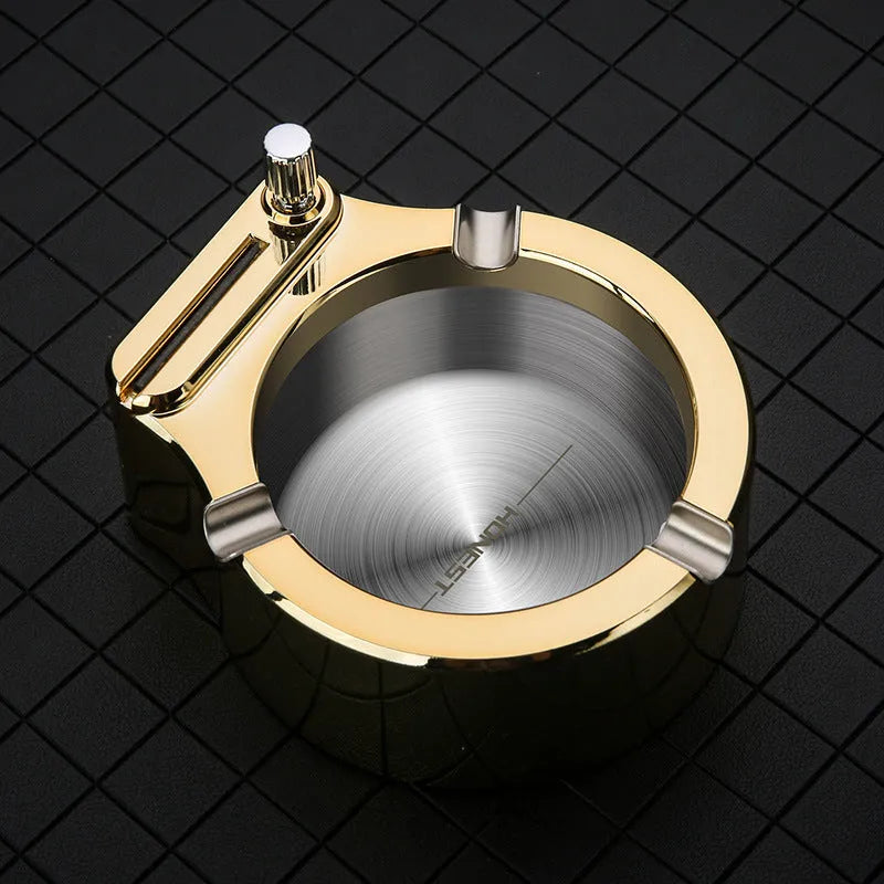 Large blue metal ashtray with a built-in permanent match lighter and three cigarette slots.