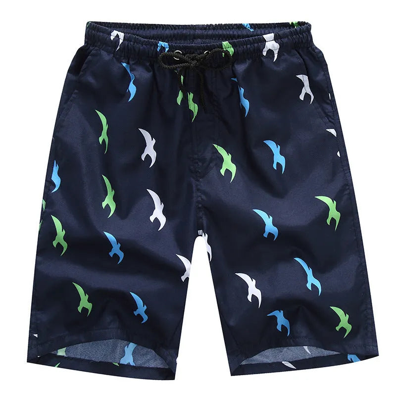 Men's loose five-point beach shorts in colourful feather print on thin cotton fabric