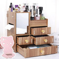 Wooden tabletop cosmetic storage box with internal compartments for organising makeup and jewellery.