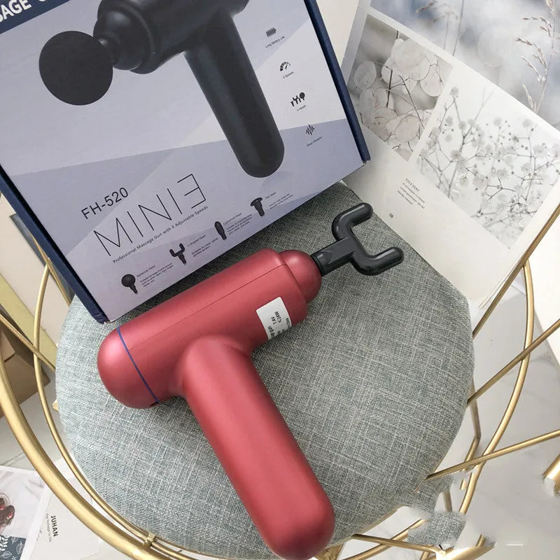 Handheld fascia gun massager in black, red, or white colour with USB charging port