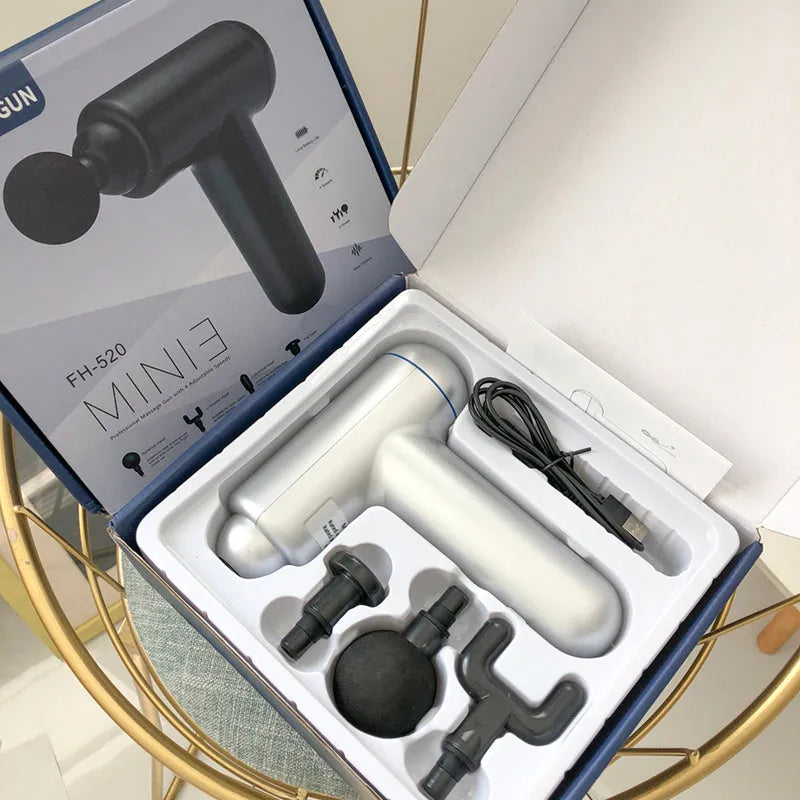 Handheld fascia gun massager in black, red, or white colour with USB charging port