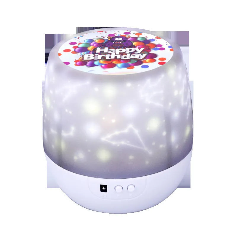 Starry sky projector lamp projecting cosmic patterns with battery power and cartoon plastic housing