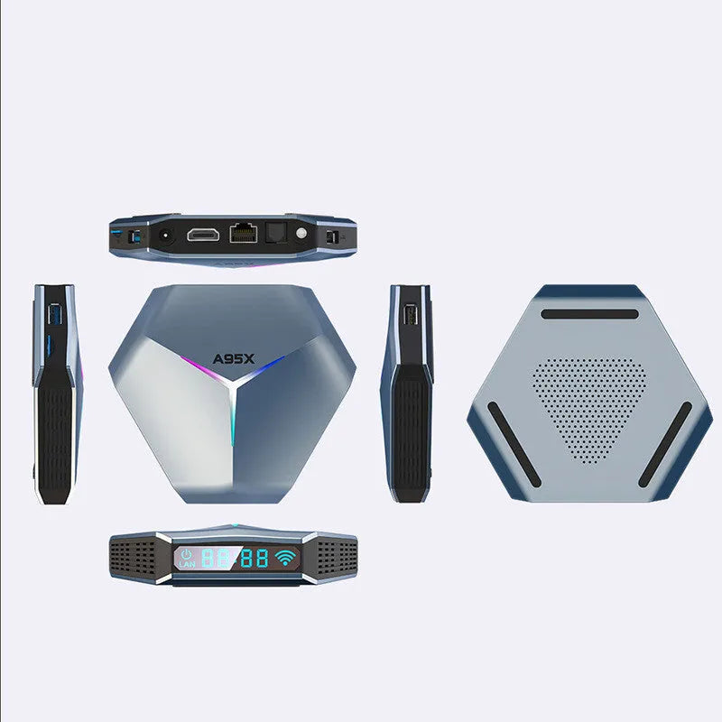 Android Smart TV Box 8K Media Player with remote control and cables on a table