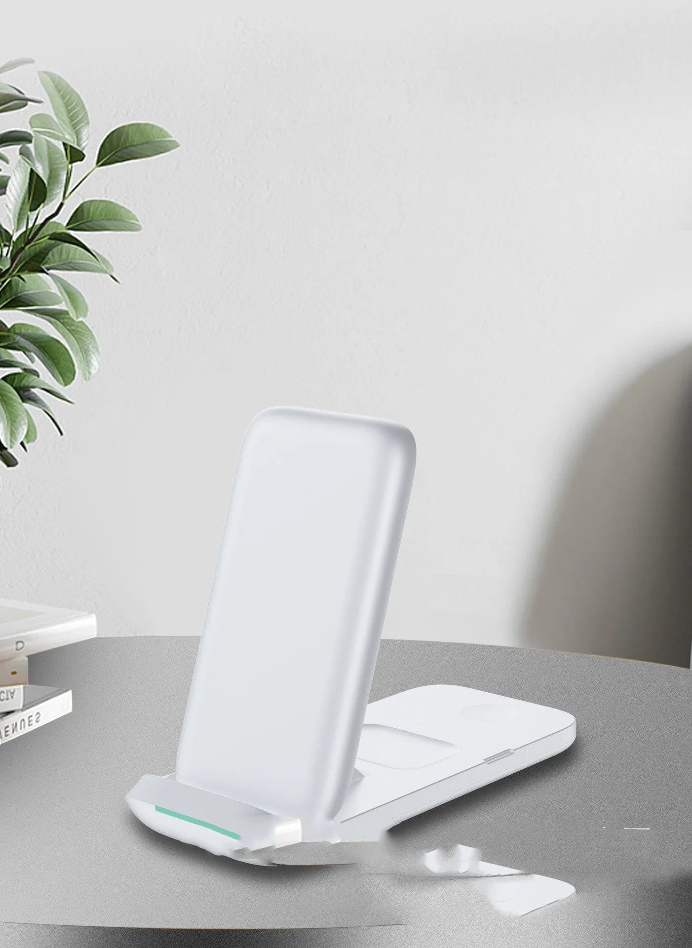 Foldable 3-in-1 wireless charging station showing charging surfaces for iPhone, AirPods, and Apple Watch