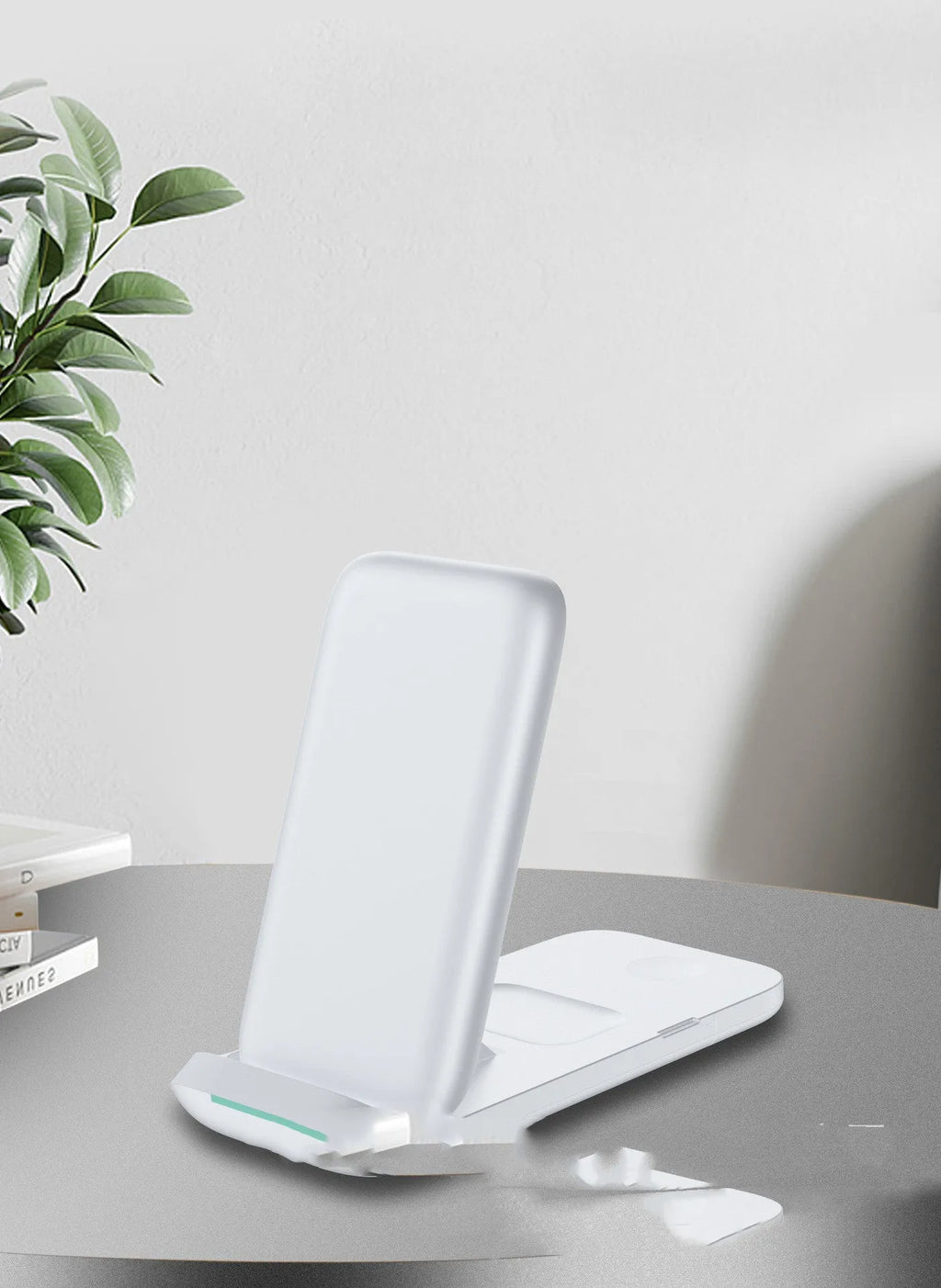 Foldable 3-in-1 wireless charging station showing charging surfaces for iPhone, AirPods, and Apple Watch