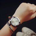Electronic digital watch with blue LED display in black or white colour options