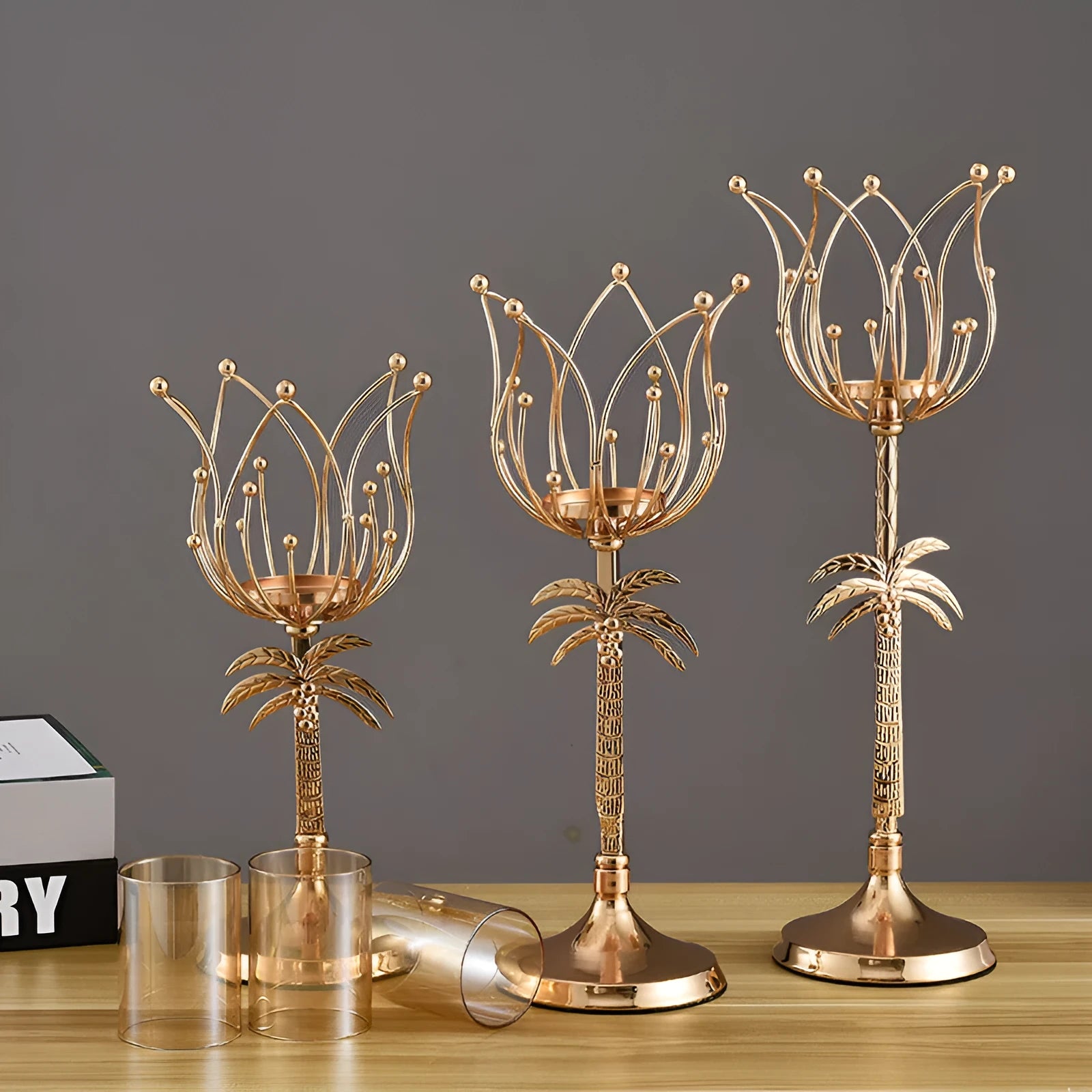 Iron candle holder in gold, size L, on dining table for candle light dinner