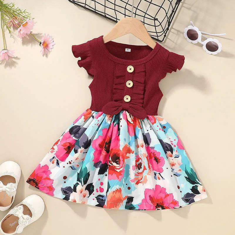 Sleeveless summer dress for a toddler girl in one of five colours: black, green, pink, red, or yellow.