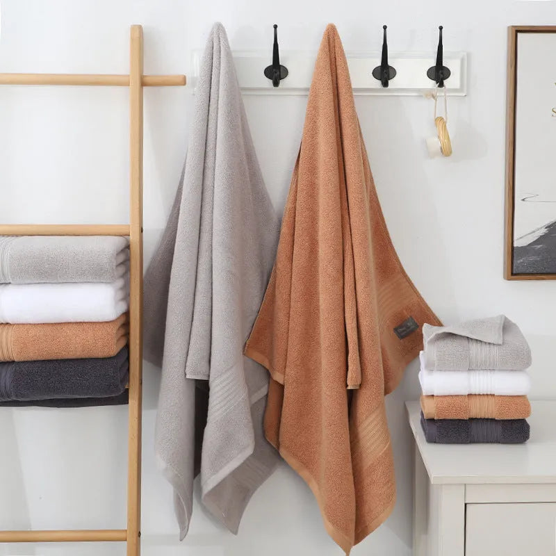 Pure cotton 500g thickened bath towel in 70x140cm size, soft and absorbent, available in white