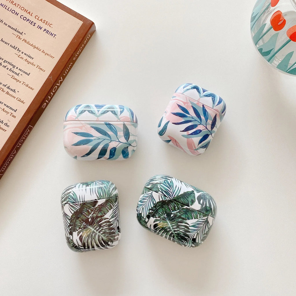Blue TPU AirPods case with a painted tropical banana leaf design.