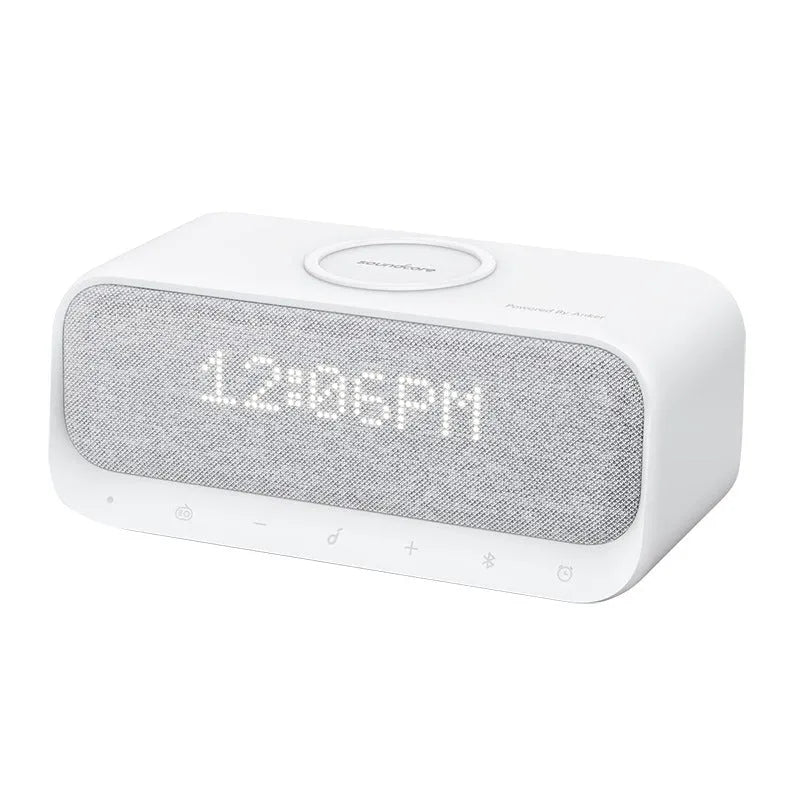 Anker Soundcore white or pink all-in-one Bluetooth speaker with wireless charging pad and digital display