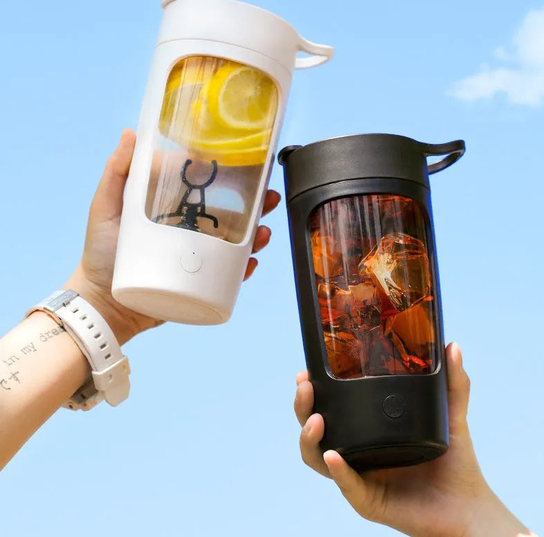 Portable rechargeable blender cup in blue, showing its 650ml capacity and compact design.