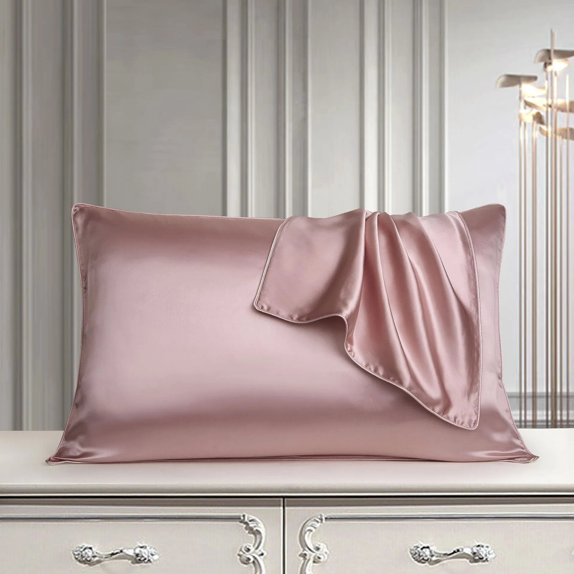 Single mulberry silk pillowcase in palace luxury style, shown in a selection of available colours.