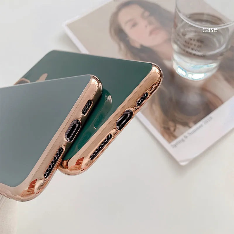 Solid colour TPU back cover phone case for iPhone models on a plain background