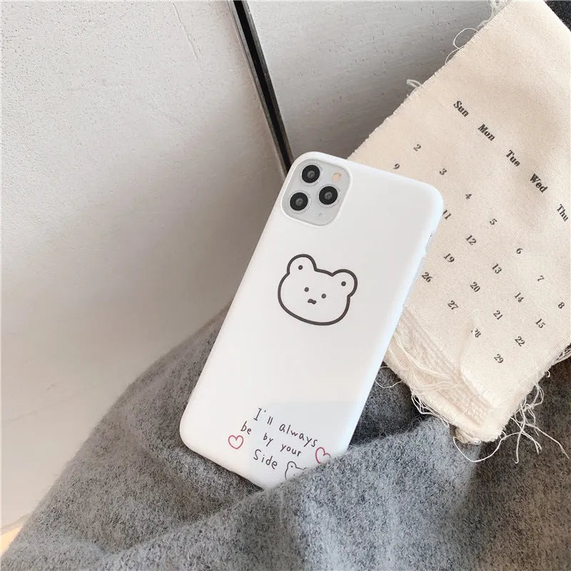 Soft silicone iPhone case with a printed Korean bear cartoon design on the back.