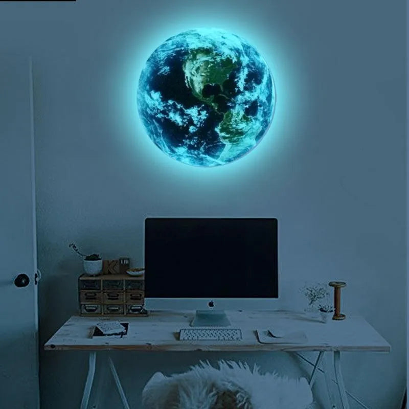 Glow in the dark 3D planet Earth wall sticker on a dark background.