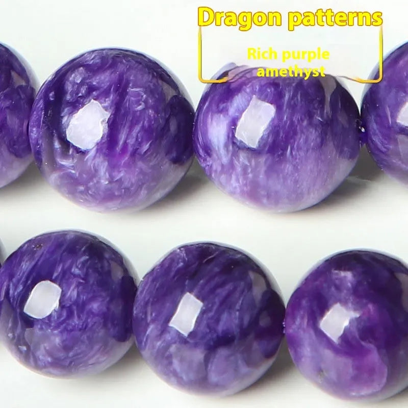 Natural purple charoite crystal bracelet with platinum-coloured metal setting, showing different bead size options.