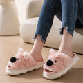 Women's indoor slippers in pink with thick EVA sole, linen fabric upper, and cartoon animal print