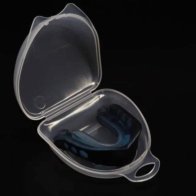 Silicone mouth guard in pink with transparent lockable storage box
