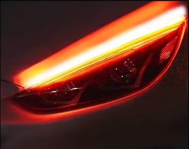 Flexible silicone car LED light strip for daytime running lights and animated turn signals.