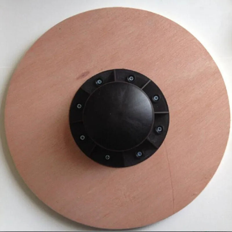 Anti-skid wooden balance board with matte finish, 39.5cm diameter, light green colour, on a gym floor