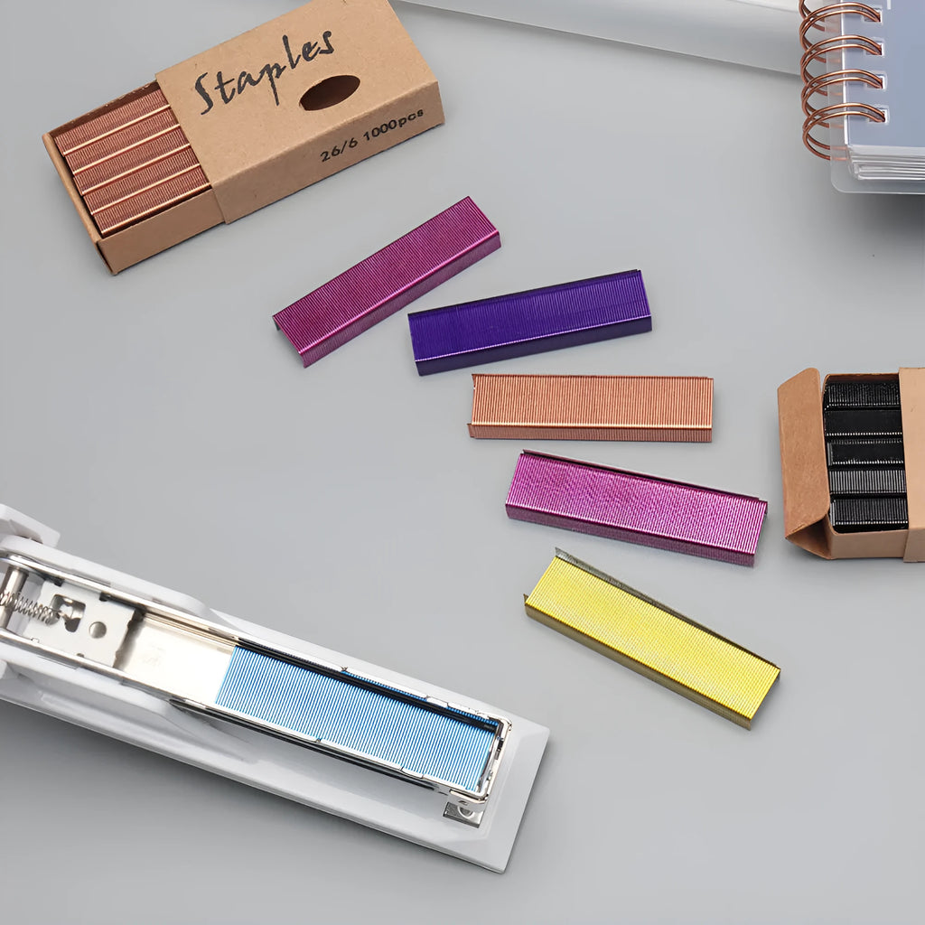 Box of 1000 metal stitching needle staples in four colour options: black, purple, rose gold and rose red