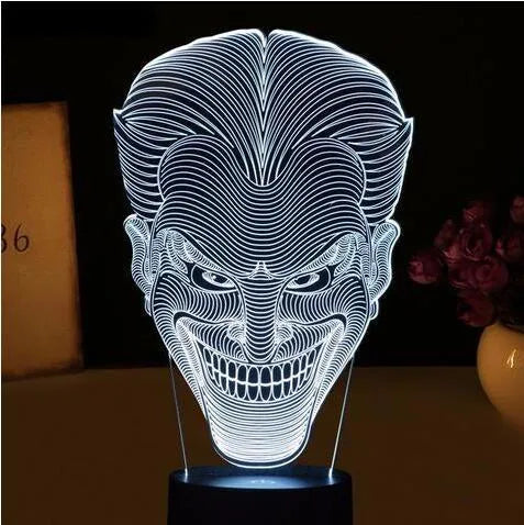 3D LED table lamp with acrylic base showing colourful gradient lighting, remote control, and USB cable