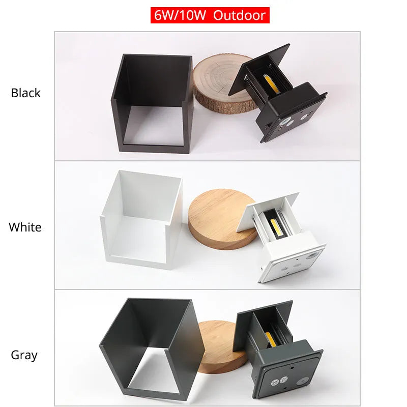 Square aluminium alloy wall lamp in black, mounted on a wall, showcasing its compact design and 360-degree light output.