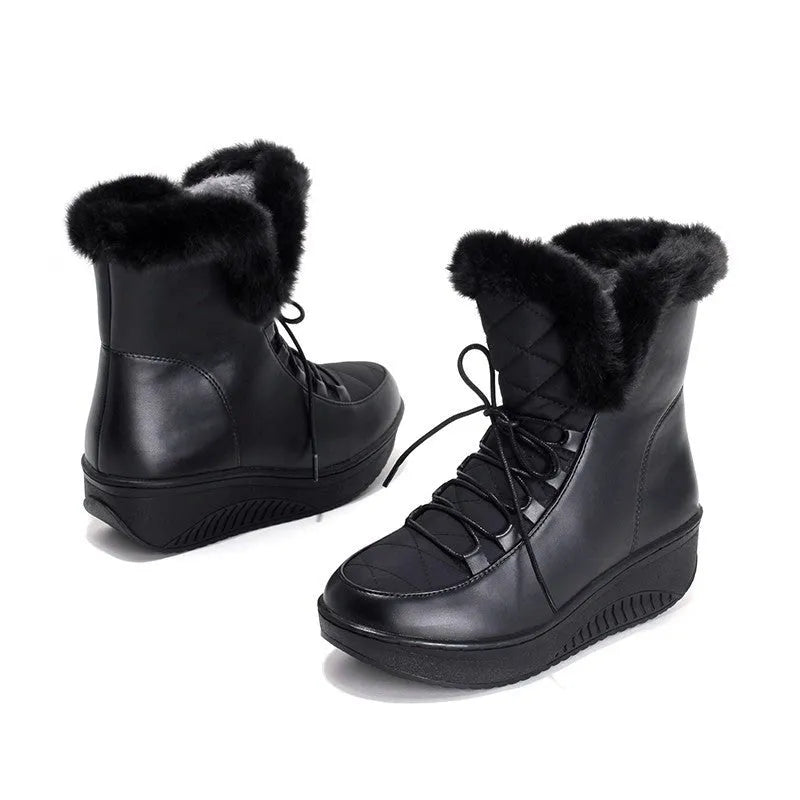 Women's black platform winter boots with lace-up closure and water-resistant PU leather