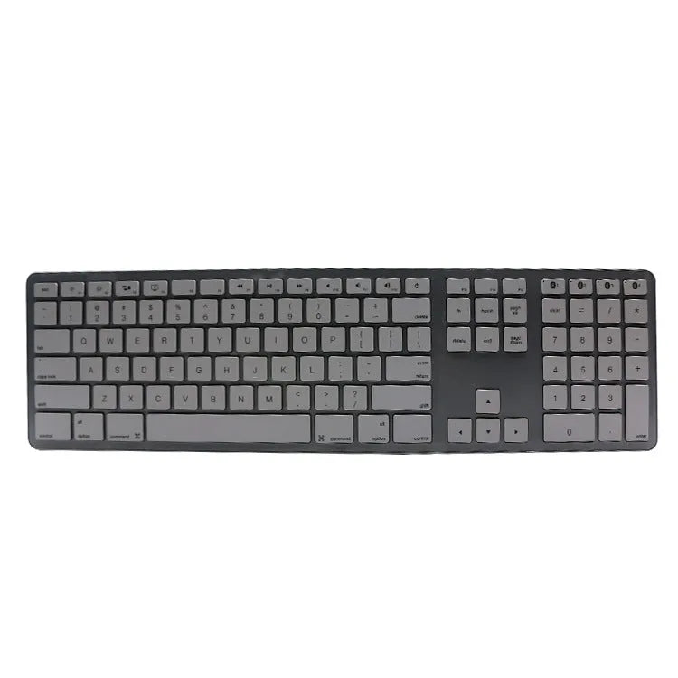 White 109-key wireless Bluetooth keyboard with three-key zone on desk