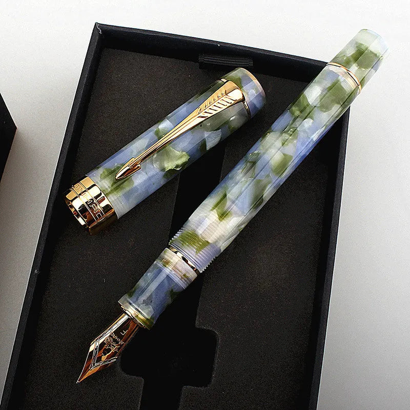 Deep green metal ballpoint pen with three tip size options for writing and drawing