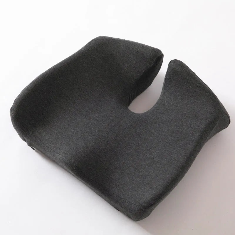 A solid-colour memory foam office chair cushion measuring 36x40x11 cm on a desk chair.