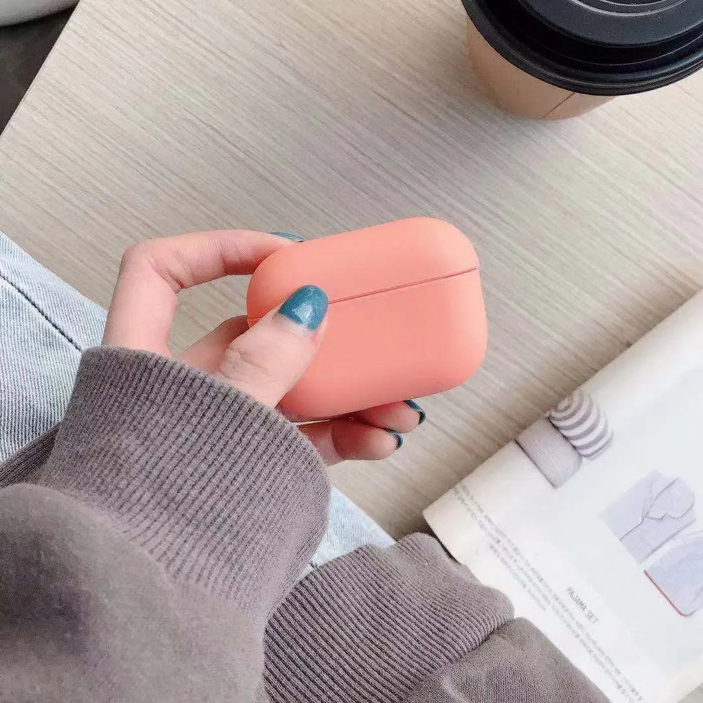 Plastic protective case for Apple AirPods Pro in various colours including black, pink, green, and blue.