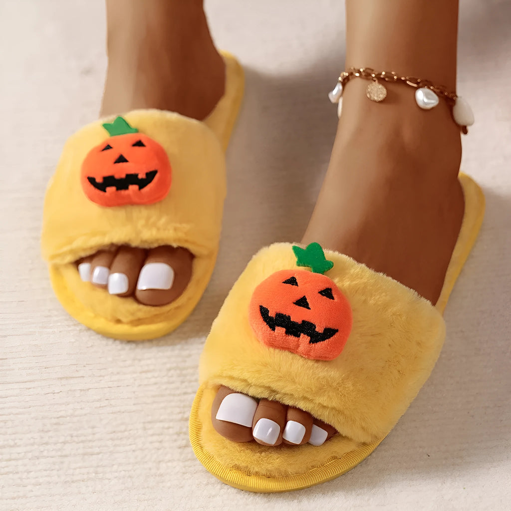 White and yellow Halloween pumpkin plush open toe slippers with synthetic fur and PVC sole.