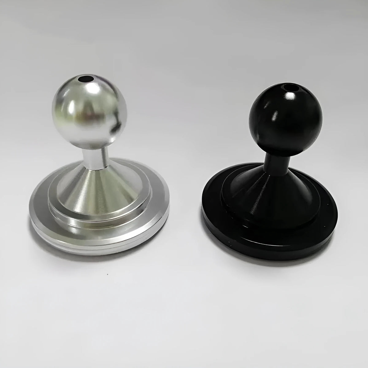 Universal aluminium alloy car dashboard mounting base plate in silver and black colour options.