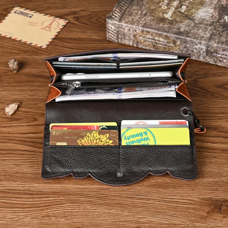 Chinese-style floral embossed tri-fold leather wallet in retro brown showing opened compartments