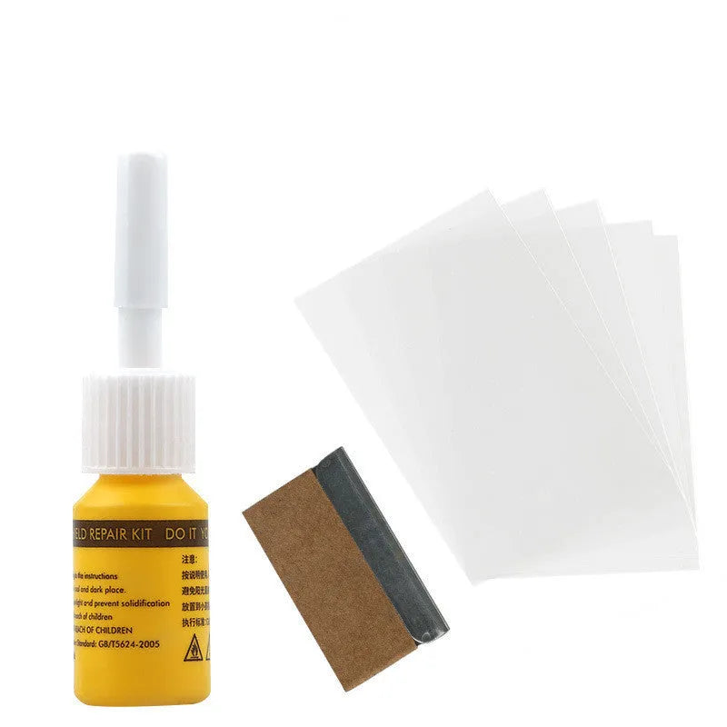 Yellow three-piece car windscreen repair kit with glass repair liquid and application tools